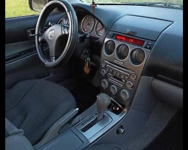 Серый Мазда 6, объемом двигателя 2 л и пробегом 230 тыс. км за 4200 $, фото 7 на Automoto.ua