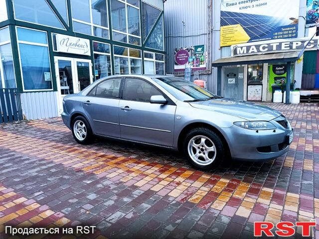 Серый Мазда 6, объемом двигателя 2 л и пробегом 302 тыс. км за 3800 $, фото 1 на Automoto.ua