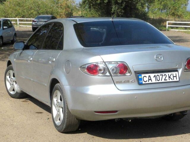 Серый Мазда 6, объемом двигателя 2 л и пробегом 206 тыс. км за 3650 $, фото 1 на Automoto.ua