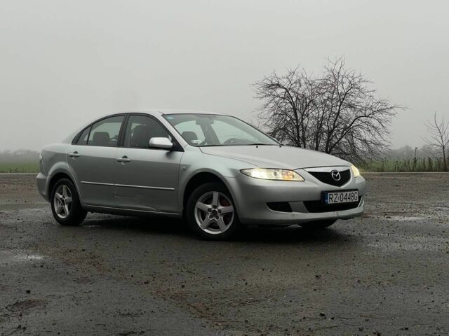 Сірий Мазда 6, об'ємом двигуна 2 л та пробігом 293 тис. км за 1900 $, фото 4 на Automoto.ua