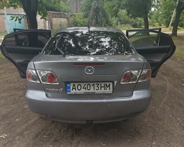 Сірий Мазда 6, об'ємом двигуна 2 л та пробігом 305 тис. км за 3000 $, фото 9 на Automoto.ua