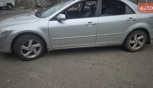 Серый Мазда 6, объемом двигателя 2 л и пробегом 239 тыс. км за 2700 $, фото 10 на Automoto.ua