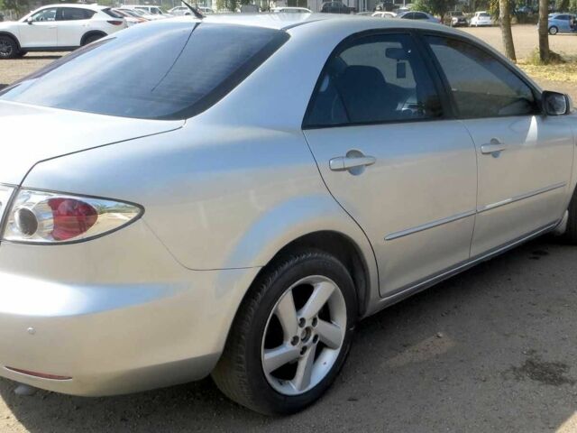 Серый Мазда 6, объемом двигателя 2 л и пробегом 206 тыс. км за 3650 $, фото 5 на Automoto.ua