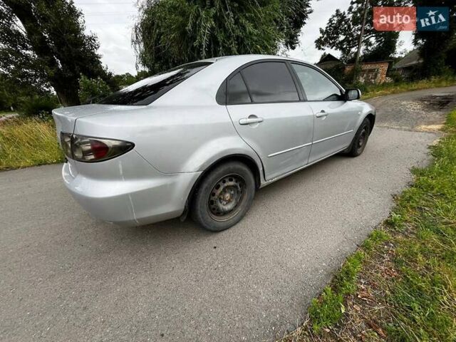 Серый Мазда 6, объемом двигателя 2 л и пробегом 275 тыс. км за 3800 $, фото 6 на Automoto.ua