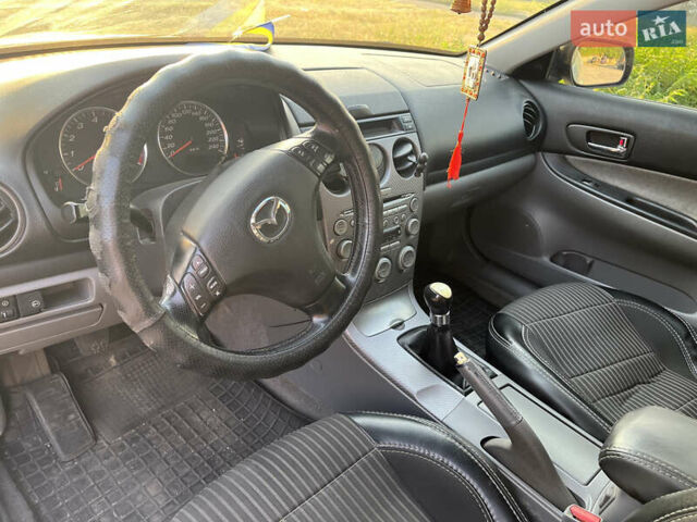 Серый Мазда 6, объемом двигателя 2 л и пробегом 330 тыс. км за 3800 $, фото 5 на Automoto.ua