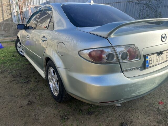 Серый Мазда 6, объемом двигателя 2 л и пробегом 550 тыс. км за 3400 $, фото 4 на Automoto.ua