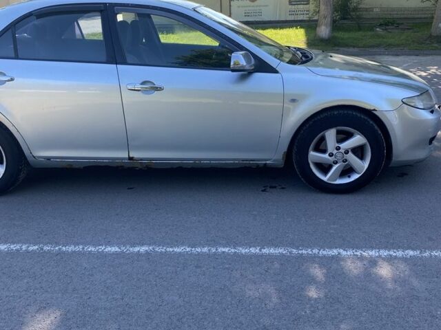 Сірий Мазда 6, об'ємом двигуна 2 л та пробігом 390 тис. км за 2600 $, фото 1 на Automoto.ua