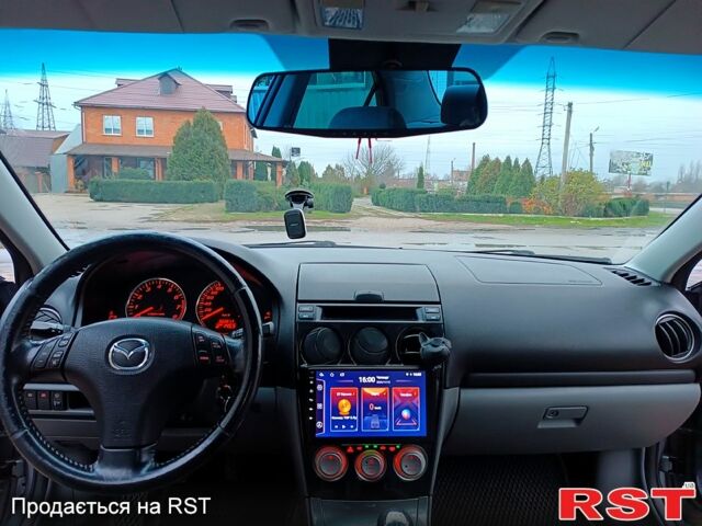 Серый Мазда 6, объемом двигателя 2 л и пробегом 302 тыс. км за 3800 $, фото 11 на Automoto.ua