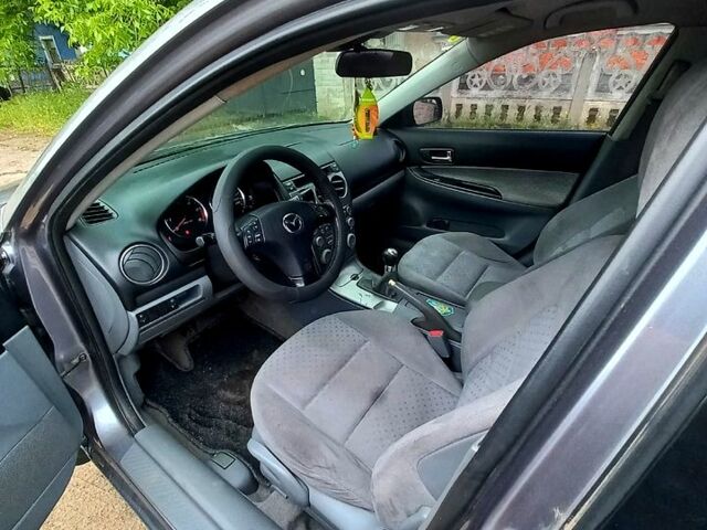 Серый Мазда 6, объемом двигателя 2 л и пробегом 283 тыс. км за 2900 $, фото 3 на Automoto.ua