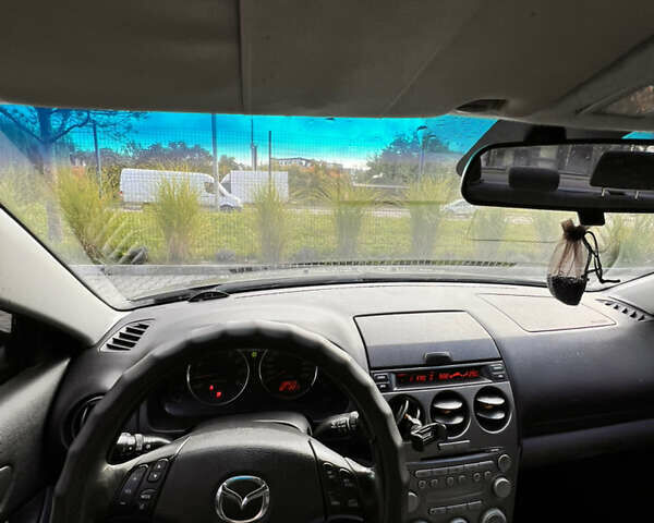 Серый Мазда 6, объемом двигателя 2 л и пробегом 388 тыс. км за 3650 $, фото 18 на Automoto.ua