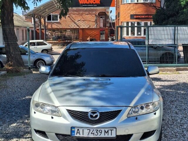 Серый Мазда 6, объемом двигателя 2 л и пробегом 220 тыс. км за 4450 $, фото 1 на Automoto.ua
