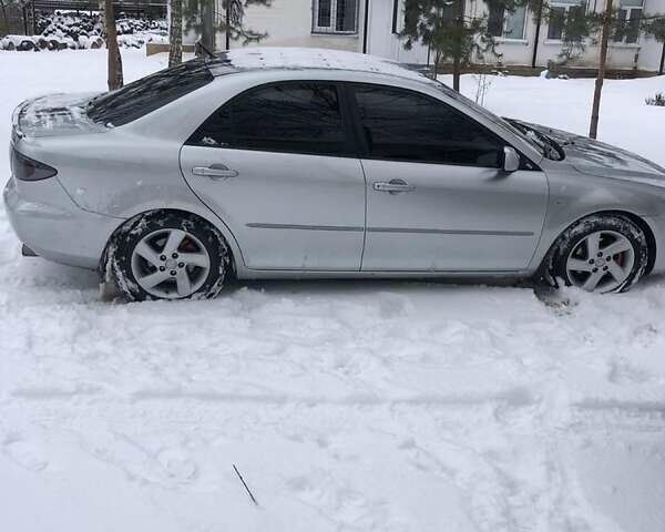 Сірий Мазда 6, об'ємом двигуна 2 л та пробігом 199 тис. км за 5600 $, фото 4 на Automoto.ua