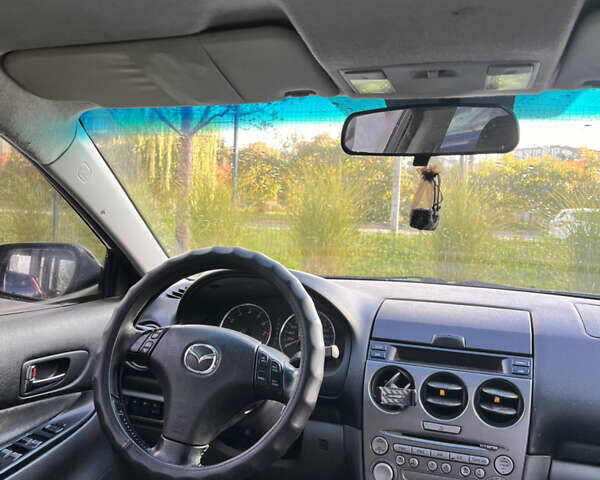 Серый Мазда 6, объемом двигателя 2 л и пробегом 388 тыс. км за 3650 $, фото 12 на Automoto.ua