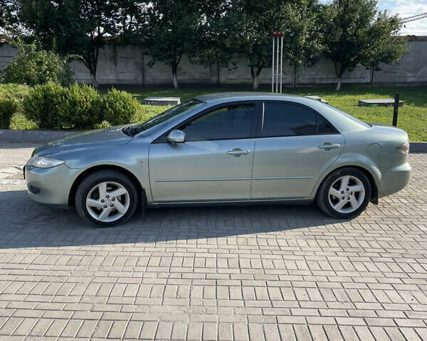 Сірий Мазда 6, об'ємом двигуна 2.3 л та пробігом 246 тис. км за 4800 $, фото 7 на Automoto.ua