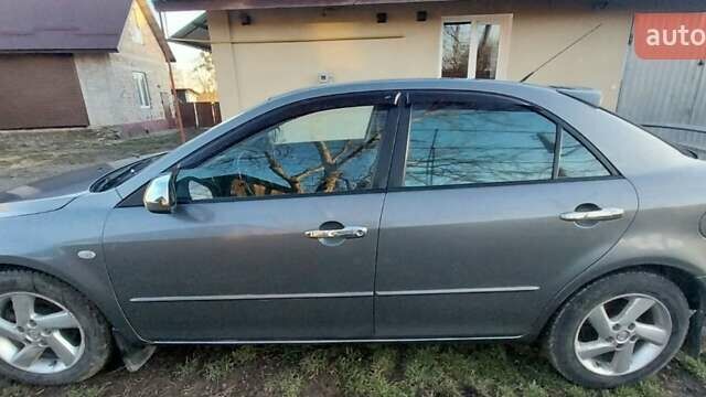 Сірий Мазда 6, об'ємом двигуна 2 л та пробігом 273 тис. км за 3300 $, фото 2 на Automoto.ua