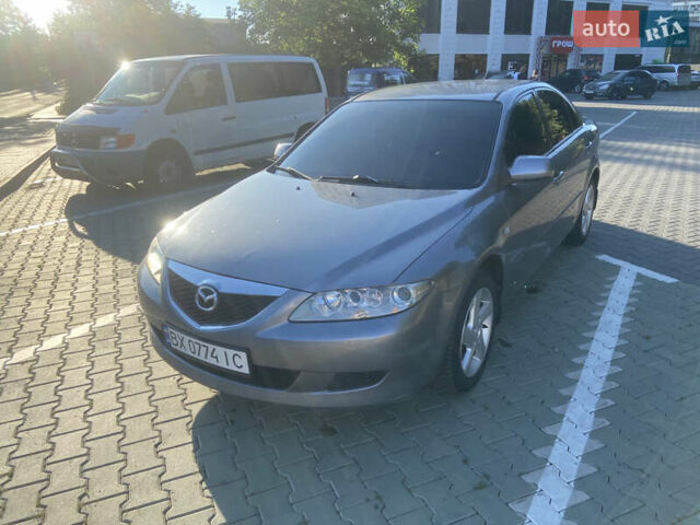 Серый Мазда 6, объемом двигателя 1.8 л и пробегом 219 тыс. км за 4000 $, фото 1 на Automoto.ua