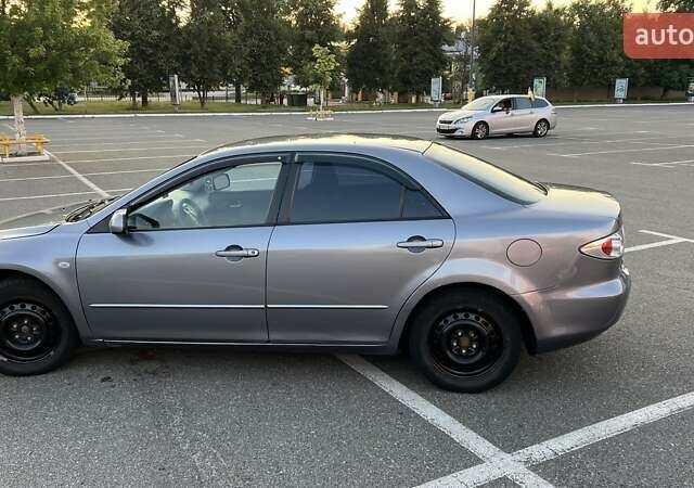 Сірий Мазда 6, об'ємом двигуна 2 л та пробігом 280 тис. км за 4100 $, фото 1 на Automoto.ua