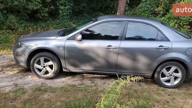 Сірий Мазда 6, об'ємом двигуна 2 л та пробігом 298 тис. км за 3400 $, фото 9 на Automoto.ua
