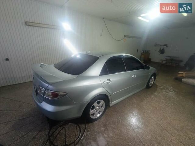 Серый Мазда 6, объемом двигателя 2 л и пробегом 536 тыс. км за 3700 $, фото 1 на Automoto.ua