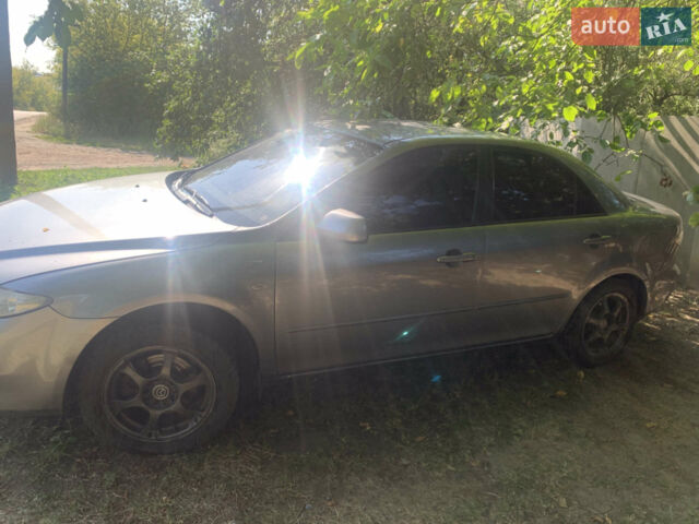 Серый Мазда 6, объемом двигателя 2 л и пробегом 365 тыс. км за 5500 $, фото 1 на Automoto.ua