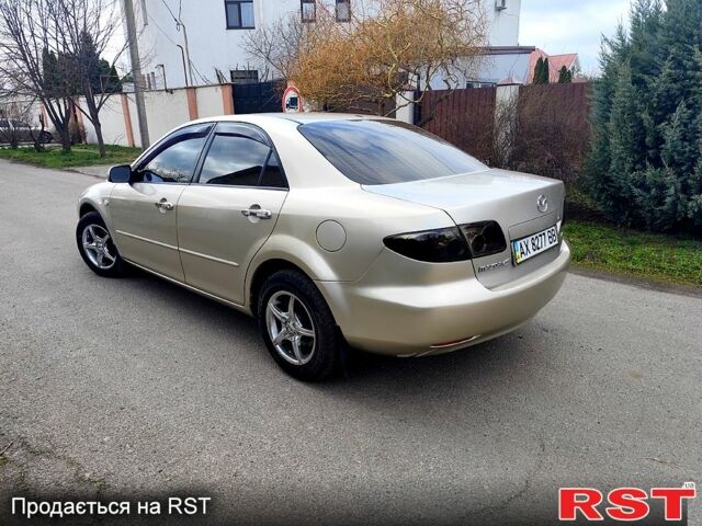 Серый Мазда 6, объемом двигателя 2 л и пробегом 290 тыс. км за 3700 $, фото 3 на Automoto.ua