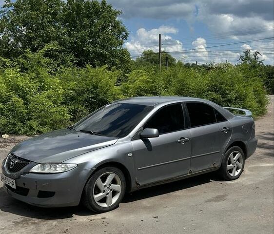 Сірий Мазда 6, об'ємом двигуна 1.8 л та пробігом 447 тис. км за 1899 $, фото 3 на Automoto.ua