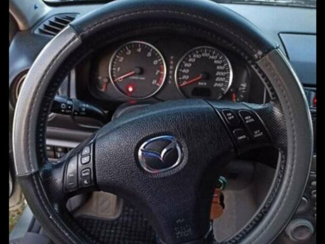 Серый Мазда 6, объемом двигателя 2 л и пробегом 230 тыс. км за 4200 $, фото 5 на Automoto.ua