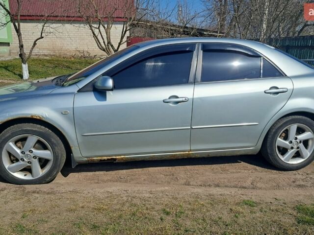 Серый Мазда 6, объемом двигателя 2 л и пробегом 247 тыс. км за 3150 $, фото 2 на Automoto.ua
