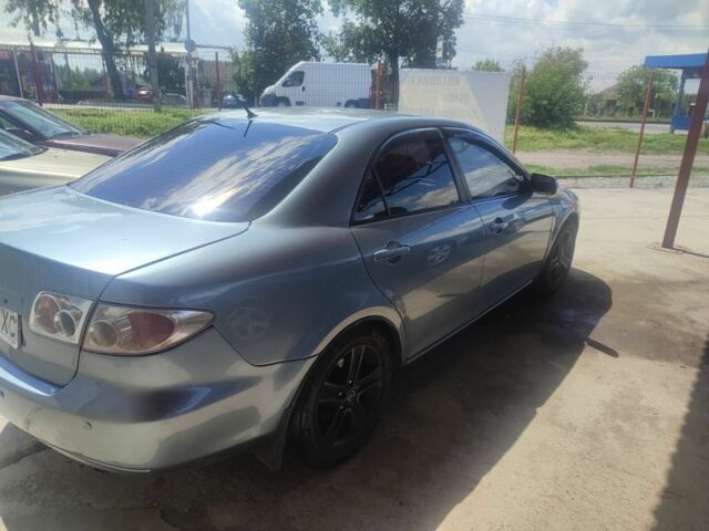 Сірий Мазда 6, об'ємом двигуна 2 л та пробігом 240 тис. км за 4204 $, фото 6 на Automoto.ua