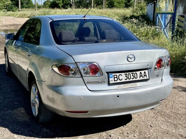 Сірий Мазда 6, об'ємом двигуна 2 л та пробігом 374 тис. км за 3348 $, фото 2 на Automoto.ua