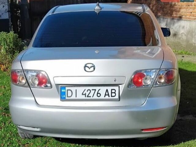 Серый Мазда 6, объемом двигателя 1.8 л и пробегом 518 тыс. км за 3350 $, фото 1 на Automoto.ua