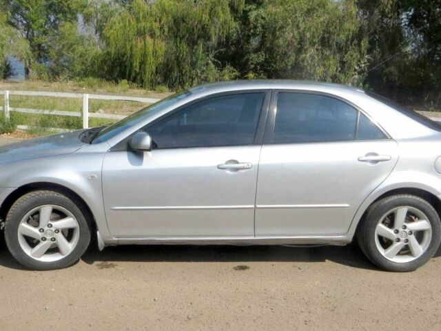 Серый Мазда 6, объемом двигателя 2 л и пробегом 206 тыс. км за 3650 $, фото 2 на Automoto.ua