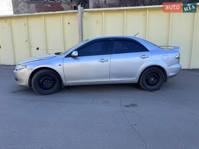Сірий Мазда 6, об'ємом двигуна 2 л та пробігом 246 тис. км за 2800 $, фото 1 на Automoto.ua