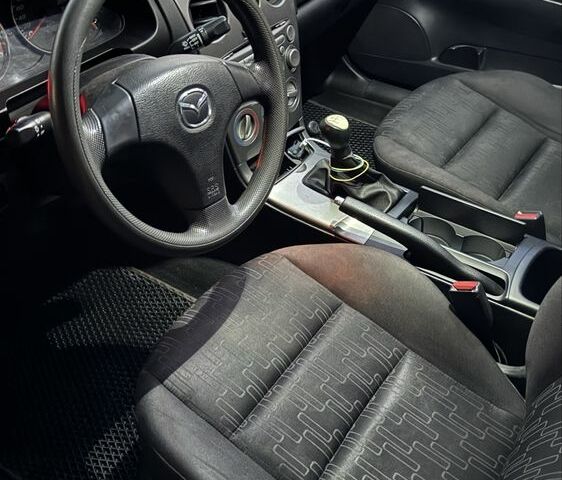 Сірий Мазда 6, об'ємом двигуна 2 л та пробігом 260 тис. км за 2951 $, фото 5 на Automoto.ua