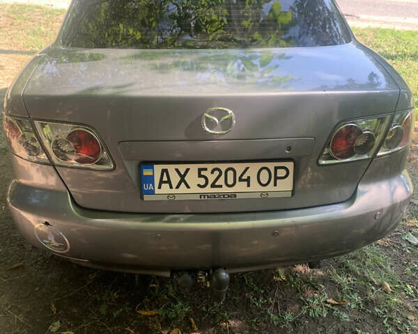 Серый Мазда 6, объемом двигателя 2 л и пробегом 365 тыс. км за 5500 $, фото 2 на Automoto.ua