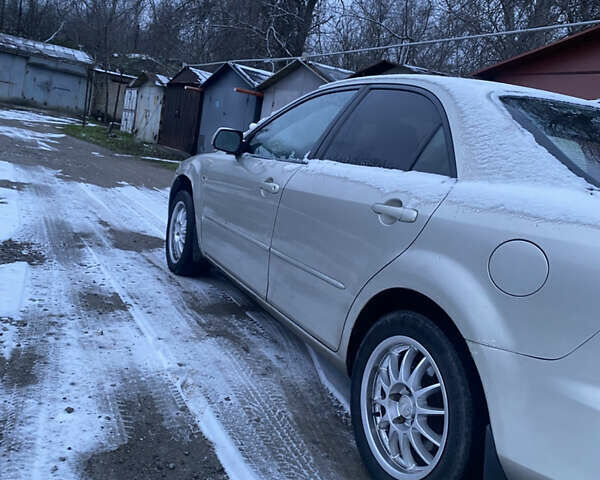 Серый Мазда 6, объемом двигателя 2 л и пробегом 47 тыс. км за 2900 $, фото 2 на Automoto.ua