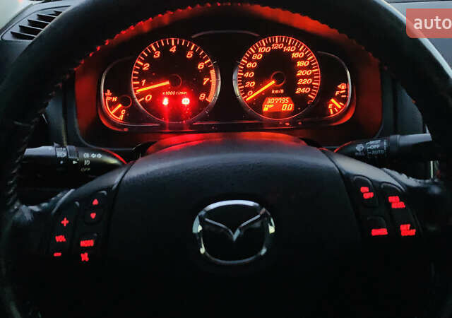 Серый Мазда 6, объемом двигателя 2 л и пробегом 310 тыс. км за 4250 $, фото 4 на Automoto.ua