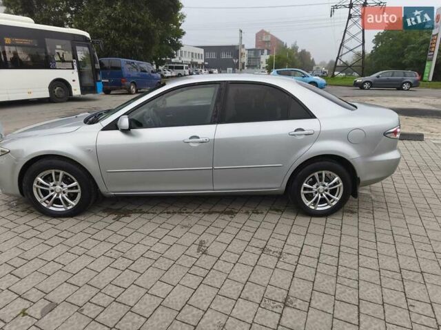 Серый Мазда 6, объемом двигателя 2 л и пробегом 222 тыс. км за 3700 $, фото 1 на Automoto.ua
