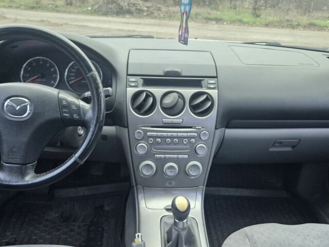 Серый Мазда 6, объемом двигателя 1.8 л и пробегом 175 тыс. км за 4999 $, фото 9 на Automoto.ua