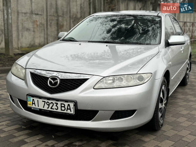 Серый Мазда 6, объемом двигателя 1.8 л и пробегом 302 тыс. км за 3800 $, фото 3 на Automoto.ua