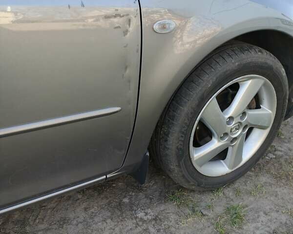 Серый Мазда 6, объемом двигателя 1.8 л и пробегом 202 тыс. км за 5200 $, фото 11 на Automoto.ua