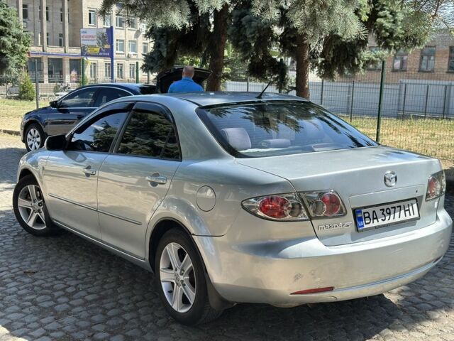 Серый Мазда 6, объемом двигателя 2 л и пробегом 240 тыс. км за 4350 $, фото 1 на Automoto.ua