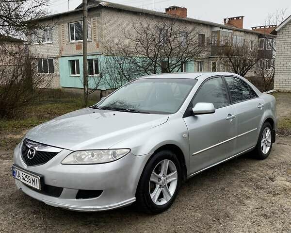 Сірий Мазда 6, об'ємом двигуна 2 л та пробігом 285 тис. км за 4300 $, фото 2 на Automoto.ua