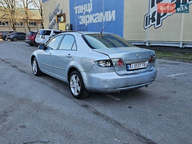 Серый Мазда 6, объемом двигателя 1.8 л и пробегом 200 тыс. км за 2300 $, фото 2 на Automoto.ua