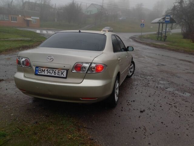 Серый Мазда 6, объемом двигателя 1.8 л и пробегом 330 тыс. км за 3350 $, фото 2 на Automoto.ua