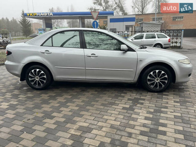 Серый Мазда 6, объемом двигателя 1.8 л и пробегом 302 тыс. км за 3800 $, фото 5 на Automoto.ua