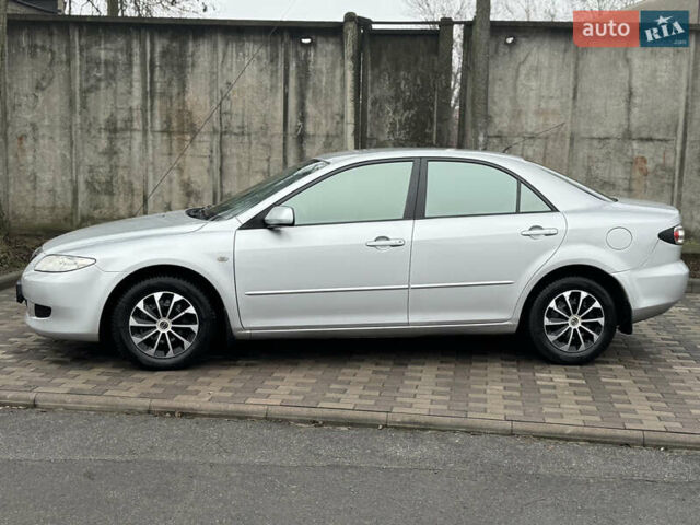 Серый Мазда 6, объемом двигателя 1.8 л и пробегом 302 тыс. км за 3800 $, фото 2 на Automoto.ua