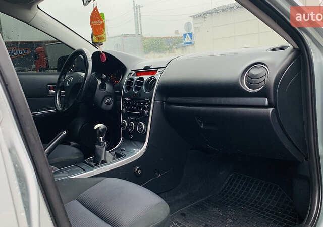 Серый Мазда 6, объемом двигателя 2 л и пробегом 307 тыс. км за 4450 $, фото 5 на Automoto.ua