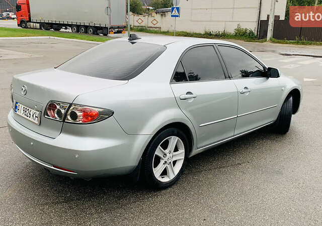 Серый Мазда 6, объемом двигателя 2 л и пробегом 307 тыс. км за 4450 $, фото 2 на Automoto.ua