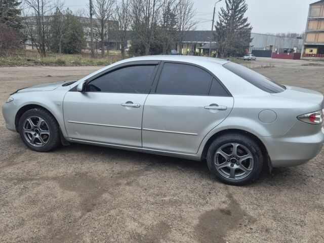 Серый Мазда 6, объемом двигателя 1.8 л и пробегом 175 тыс. км за 4999 $, фото 2 на Automoto.ua